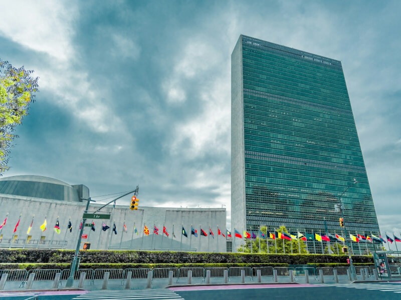 Tall building with a line of flags in front, United Nations Headquarters